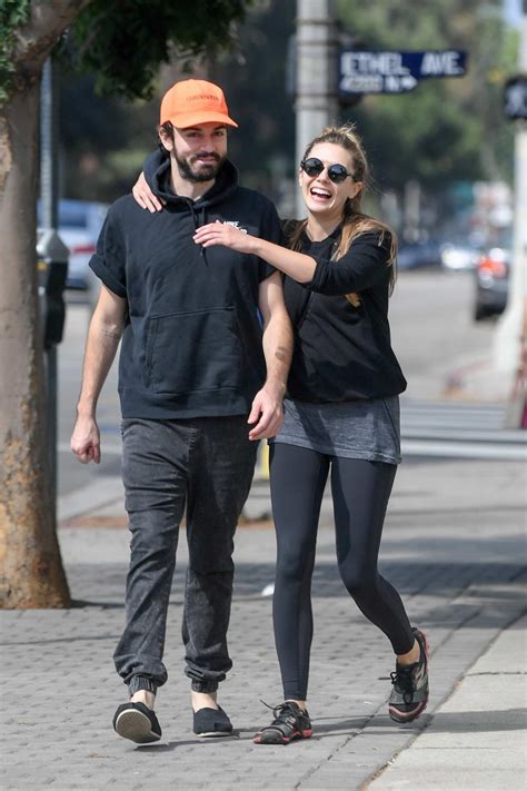 Elizabeth Olsen packs on the PDA with her husband Robbie Arnett